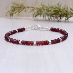 Deep Red Garnet Bracelet, Tiny Gemstones, Dainty Gemstone Stacking Bracelet, Sterling Silver or Gold Fill, January Birthstone This bracelet is very dainty - beads measure about 2-2.5mm apiece AAA Quality Please Feel Free To Contact If You Have Any Query. Orders are shipped within 1 business working day, excluding orders made on Sunday or national holidays. Domestic delivery takes 5-7 business days. International delivery takes 11-23 business days. PAYMENT METHOD : PayPal only Please send all payments within 7 days . Return policy: We are very confident on our fine jewelry will meet your expectations, your satisfaction is our priority. However, if for any reason you are not satisfied with our product, you may return your order within 14 days from the date of shipment. The item must be retur Ruby Beaded Bracelets With Gemstone Beads As Gift, Ruby Beaded Bracelets With Round Beads As Gift, Ruby Beaded Bracelets As A Gift, Ruby Beaded Bracelets With Round Beads For Gift, Gift Ruby Gemstone Beaded Bracelets, Adjustable Ruby Gemstone Bracelet, Adjustable Garnet Gemstone Bracelets, Handmade Adjustable Ruby Bracelets, Adjustable Garnet Bracelets Gift