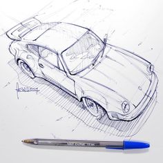 a pencil drawing of a car on a white paper with a blue marker next to it