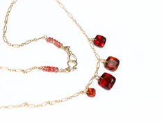 THE JEWELRY IS SHIPPED via DHL EXPRESS (2-5 days delivery door to door). THE DHL SHIPPING COST IS INCLUDED IN THE PRICE. The Lava Necklace - Hessonite Garnet Necklace, Red Orange Gemstone Necklace ► Measurements / Details: - Necklace Length: Made to order - Clasp: Secure Artisan Clasp (possible to change to a regular 9mm Lobster Clasp, just please leave a note during the checkout or write me) - Gold: High quality 14K Gold Filled ► Gemstones: The Necklace includes excellent AAA quality gemstones, Red Faceted Carnelian Jewelry, Elegant Red Faceted Necklace, Red Pendant Crystal Necklaces With Gemstone, Red Gemstone Pendant Crystal Necklaces, Red Gemstone Pendant Necklaces, Red Gemstone Pendant Necklace, Red Faceted Pendant Necklaces, Red Gemstone Pendant Crystal Necklace, Red Crystal Pendant Necklaces