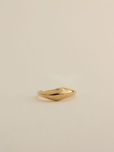 Our most popular Yin Ring celebrates organic shapes and the beauty of balance. At first glance, it appears as a sleek dome ring shining on your finger. Upon closer inspection, you'll notice a charming wobble at the top, creating a gentle wave that nestles well against another Yin Ring. People love stacking two together, often mixing metals for a unique look. We wear this ring as a reminder that the beauty of balance and movement can be more rewarding than static symmetry. Minimalist Dome Ring As Gift, Minimalist Concave Dome Ring As Gift, Minimalist Concave Wedding Rings, Minimalist Concave Rings For Gifts, Minimalist Oval Dome Ring For Everyday, Minimalist Domed Ring As Gift, Minimalist Domed Ring With Polished Finish, Minimalist Domed Dome Ring With Polished Finish, Minimalist Polished Dome Ring