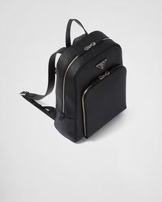 Black Saffiano Leather Backpack | PRADA Designer Business Backpack In Coated Canvas, Designer Coated Canvas Backpack For Business, Luxury Coated Canvas Leather Backpack With Zipper, Luxury Black Bags With Metal Zipper, Classic Coated Canvas Backpack With Zipper, Classic Coated Canvas Backpack With Zipper Closure, Luxury Leather Bag With Metal Zipper, Designer Leather Backpack With Zipper, Designer Leather Backpack With Zipper Pocket