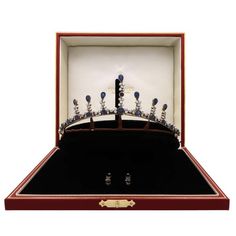 For Sale on 1stDibs - An extremely elegant late Victorian sapphire and diamond convertible tiara and earring set, in silver and gold, circa 1900’s. This beautifully handcrafted Victorian Hand Set Jewelry For Formal Occasions, Luxury Wedding Crown Jewelry, Formal Diamond Jewelry With Teardrop Crown, Elegant Jewelry With Rose Cut Diamonds And Sapphire, Classic Sapphire Jewelry For Evening, Victorian Jewelry With Prong Setting For Formal Occasions, Victorian Sapphire Jewelry For Formal Occasions, Luxury Crown-shaped Jewelry With Prong Setting, Formal Victorian Sapphire Jewelry