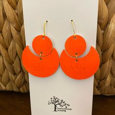 Lightweight Cork Earrings. Handmade Neon Highlighter Orange Color. Made With Cork That Is Backed With Leather And Hypoallergenic Gold Ear Wires. Overall Length Is Approximately 2 And 1/4 Inches. These Bright Earrings Can Be Dressed Up Or Down. Wear With The Bright Colors Of The Spring And Summer Trends Or Add A Pop Of Color To Any Neutral Outfit. Super Lightweight, Versatile And Original! Nickel Free Orange Earrings For Everyday, Nickel-free Orange Earrings For Everyday Wear, Modern Orange Earrings For Everyday Wear, Handmade Orange Earrings For Everyday, Handmade Orange Everyday Earrings, Everyday Handmade Orange Earrings, Modern Orange Drop Earrings, Bright Earrings, Cork Earrings