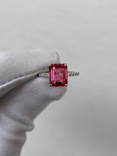 Vintage Pink Tourmaline Ring, Emerald Cut Tourmaline Ring, 925 Sterling Silver, Pavé Ring, Wedding Ring, Engagement Ring, Gift for her  Handmade ring. Stone : Lab Pink Tourmaline  Gemstone Cut : Emerald Cut Stone Size : 9mm×7mm Side Stone : Cubic Zirconia Metal  : 925 Sterling Silver Plating:  Platinum Plated , Rose Gold Plated , Gold Plated. Personalization:10K/14K/24K/GOLD/SILVER/PLATINUM/ROSE-GOLD/WHITE GOLD. (Contact me)  All items come in a beautiful jewelry box.  Since all out Jewelry is H Pink Emerald Cut Sterling Silver Ring, Pink Emerald-cut Tourmaline Jewelry, Pink Emerald Cut Tourmaline Jewelry, Silver Tourmaline Ring With Prong Setting, White Gold Tourmaline Ring With Accent Stones, Emerald Cut Tourmaline Gemstone Rings, Fine Jewelry White Gold Tourmaline Rings, Emerald Cut Tourmaline Promise Ring, Pink Emerald Cut Solitaire Ring