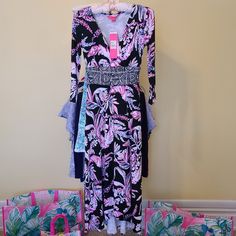 Lilly Pulitzer Fleuris Midi Dress In Wild Within Engineered Knit. Fabric Has Stretch To It. Nwt. Msrp: $218. Size: Xxs Cute Print With V-Neck, Ruched Waist Line, And Off Center Split Hem In Front Of Dress. Sleeves Are 3/4 Style. Cat Friendly, Smoke Free Home. Casual Long Sleeve Maxi Dress For Holiday, Fitted Maxi Dress For Spring Holiday, Holiday Printed Fitted Dress, Holiday Fitted Printed Dress, Fitted Printed Holiday Dress, Lilly Pulitzer Maxi Dress, Summer Shift Dress, Skort Dress, Dress Sleeves