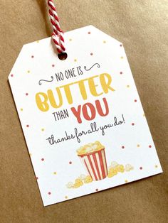 a paper tag with the words, no one is butter than you thank for all you do