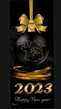 a black christmas ornament with a gold bow on it and the words,'holiday