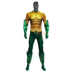 the green and gold costume is displayed on a mannequin