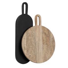 two wooden cutting boards next to each other on a white background, one with black handles