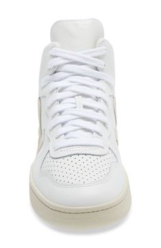 Perforated details and a cushioned footbed offer sporty style and comfort in this eco-friendly leather sneaker made to make a difference. Removable insole Leather upper/textile lining/rubber sole Made in Brazil Top Sneakers Women, Mid Top Sneakers, Mid Top, Made In Brazil, Sporty Style, Leather Sneakers, A Logo, High Top Sneakers, Brazil