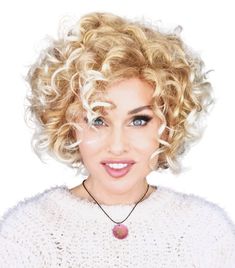 Angelina Wig by WigPro | Synthetic Wig has voluminous loose curls making this a wearable contemporary classic. Messy Curly Bob, Short Locks, Synthetic Hair Care, Dramatic Necklace, Tempura Batter, Medium Curly, Curly Hair Extensions, Short Curly Wigs, Shoulder Length Hair Cuts