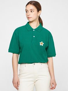 Editor's NotesThis essential polo shirt is simply accented with a dense embroidery of signature flower motif and easily goes with any bottoms. It's cut from soft touch cotton and poly-blend pique.- Polo collar- Half placket with button fastenings- Graphic embroidery on the chest- Drop shoulder- Short sleeves- Relaxed fit- Unisex wear- Minimize distortion after washingMeasurements (in.)S / M / L- Total Length: 28.0 in. / 29.5 in. / 31.1 in.- Shoulder: 19.3 in. / 20.5 in. / 21.3 in.- Chest: 20.9 in. / 22.0 in. / 22.8 in.- Sleeve Length: 8.3 in. / 8.7 in. / 9.1 in.Model Info:- Man: 5' 10.1, 143.3 lbs / Fitting size L- Woman: 5' 5, 112.4 lbs / Fitting size SComposition & Care- 80% Cotton, 20% Polyester (20's)- Recommend separate wash at low temperature water using neutral detergent or dry Green Cotton Polo Shirt With Collared Neckline, Green Collared Cotton Polo Shirt, Green Cotton Collared Polo Shirt, Spring Cotton Polo Shirt With Collared Neckline, Spring Cotton T-shirt With Collared Neckline, Green Casual Polo Shirt For Spring, Green Relaxed Fit Polo Shirt, Spring Polo Collar T-shirt, Casual Embroidered Cotton Polo Shirt