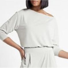 Express Silky Sueded Jersey Off The Shoulder Tee Available Sizes: Large & Xl Color: Silver Heather Gray Brand New With Tags Product Details Description Sleek Enough To Wear Out, Comfy Enough To Lounge In, This Off-The-Shoulder Version Of Our Tee Will Be Your New Casual Go-To. Wear It Everywhere. Now In Our Softest, Most Comfy Silky Sueded Jersey Fabric. Features & Fabric Off The Shoulder Neckline Three Quarter Length Sleeves Straight Hem Modal/Polyester Casual 3/4 Sleeve Loungewear Tops, Solid Color Tops With 3/4 Sleeve For Day Out, Chic White Top With 3/4 Sleeves, Chic White 3/4 Sleeve Top, White Relaxed Fit Top With 3/4 Sleeves, Off The Shoulder Tee, Heather Gray, Jersey Fabric, Three Quarter