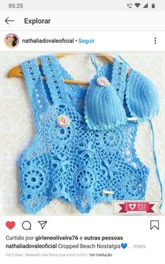 a blue crochet top and panties on a hanger with the words explore