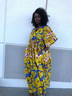 "African Ankara full length off the shoulder Maxi Dress handmade women dress with sides pockets Different multi color print to choose from Contact me for other sizes or if you want different body measurements. Let me know if you want it in other fabric other than the one in the pictures Polycotton fabric Check the measurement before purchasing. Please take your measurements before you order. Please don't assume that you know your measurements because every store has their own size guide. Let me Vacation Maxi Dress With Pockets, Beach Maxi Dress With Pockets, Printed Yellow Maxi Dress, Short Sleeve Maxi Dress With Pockets For Vacation, Yellow Midi Dress With Pockets, Blue Maxi Dress With Pockets, Yellow Printed Long Maxi Dress, Yellow Long Printed Maxi Dress, Bohemian Short Sleeve Maxi Dress With Pockets