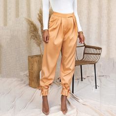 Bow Tie Pants Show your unique style with these Bow Tie Pants! These high-waisted dress pants have a twist, the statement making bow-tie at the hem. Making them perfect for any occasion. Be ready for the compliments! 💁‍♀️ Bow Tie Pants, High Waisted Dress Pants, Satin Pants, Polyester Spandex Fabric, Type Of Pants, High Waisted Trousers, Wholesale Fashion, Long Pants, High Waisted Pants