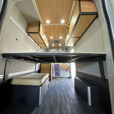 the interior of an rv with wood paneling