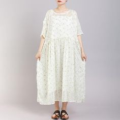 Round Neck Print Floral Pleated Short Sleeve Dress - Omychic Casual Loose Summer Maxi Dress, Casual Loose Maxi Dress For Summer, Loose Summer Dresses With Floral Print, Loose Spring Vacation Dresses, Flowy Loose Casual Dresses, Casual Flowy Loose Dress, Cream Short Sleeve Maxi Dress For Spring, Casual Loose Maxi Dress For Spring, Casual Loose Maxi Dress