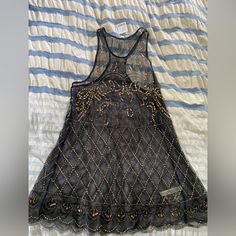 Free People Extra Small Sheer Beaded Dress Spring Black Embellished Sequin Dress, Spring Embellished Black Sequin Dress, Black Embellished Sequin Dress For Spring, Summer Black Embellished Mini Dress, Black Sleeveless Embellished Sequin Dress, Embellished Sleeveless Mini Dress For Festival, Black Sequin Festival Dress, Black Sequined Dresses For Festivals, Black Sequined Dress For Festival