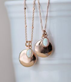 "A sweet new locket made with rose gold and an opal charm. Locket is rose gold plated and hangs from dainty rose gold plated chain. A small opal charm hangs off the side. See details and lengths below. * Locket - 13mm (1/2\") * Singapore chain -Adjusts to 18\" and 20\" only (has small ring to connect clasp at 18\" and 20\" lengths along chain) * Satellite Chain - Adjusts from 16-18\", or 18-20\" * Opal charm - Lab created opal, 6x4mm Please choose desired chain style and length at checkout. List Dainty Rose Gold Locket Necklace For Anniversary, Rose Gold Oval Necklaces With Charms, Oval Rose Gold Necklaces With Charms, Delicate Rose Gold Locket Jewelry, Rose Gold Oval Pendant Jewelry For Mother's Day, Rose Gold Charm Necklace With Round Pendant For Her, Round Rose Gold Locket Necklace For Gifts, Rose Gold Locket Necklace With Round Pendant, Dainty Rose Gold Pendant Locket Necklace