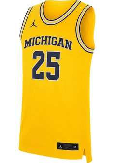 Feel like one of the Wolverines in this Michigan Wolverines Basketball Jersey! You'll definitely stand out in this Michigan Gold Basketball Replica Jersey. Featuring a screen print of Michigan over #25 on front and back, this Michigan Wolverines Basketball Jersey is the perfect way to show off your Wolverines support. Collegiate College Jersey With Moisture-wicking, Collegiate Sleeveless Jersey With Team Logo, Collegiate Moisture-wicking Jersey For College, Collegiate Sports Jersey, Team-colored Varsity Jersey For Sports, Varsity Team-colored Jersey For Sports, Team-colored Varsity Sports Jersey, Varsity Sports Jersey In Team Colors, Collegiate Sports Jersey With Letter Print