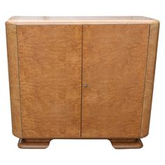 a wooden cabinet sitting on top of a white background