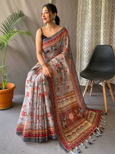 Charm your way through any gathering with the elegant and splendid Perfect Ash-Grey Kalamkari Print Cotton Occasion Saree with Blouse. Crafted from smooth and pure malai cotton, this saree is designed with intricate kalamkari prints, giving your traditional look a stylish twist. The ash-grey palette of this saree is truly stunning and is complemented with a contrasting pallu and cute tassels, tying the entire ensemble together beautifully.
Measuring 5.50 meters, this saree provides ample fabric Kalamkari Prints, Kalamkari Print, Grey Saree, Kalamkari Saree, Bollywood Wedding, Contrast Blouse, Printed Saree, Silk Sarees Online, Cotton Sarees