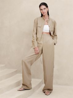 Easy and lightweight, this relaxed pant balances sharp tailoring with the lived-in look of linen.  We crafted this pair in a beautiful Italian fabric that blends luxurious linen with soft, silky  TENCEL™ lyocell.  Plus, we hid a bit of elastic at the back waistband for a custom fit.  Mid rise (9. 75"), wide leg.  Full length.  Fabric from Italy's Olimpias mill.  Sustainability: Made with TENCEL™ lyocell, a sustainably sourced fiber from responsibly-harvested trees.  Zip fly with hook-and-bar closure.  Side seam pockets.  Unlined.  Mid rise (9. 75") with a straight leg.  Full length.  Inseams: Petite/Short 29. 5", Regular 31. 5", Long/Tall 34. 5" Model: Size S, 5'10" (178cm). Straight Pants Outfit, Summer Shopping, Relaxed Trousers, Pants Skirt, Petite Shorts, Basic Fits, Petite Jeans, Luxury Linen, Khaki Color