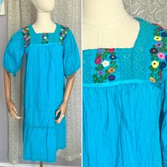 Such an absolutely beautiful dress in cool cotton. The turquoise blue background and multi stitching in the embroidery really pops! Check out the cut out lace and tiny tucks in the fabric.  Please note: The background color can best be described as aqua or turquoise blue. Please keep in mind that different devices vary in lighting and color. If you are shopping for a particular color, please know that this is being sold as shown and described. No returns for "doesn't match" or "wrong color". Ove Blue Traditional Embroidered Cotton Dress, Blue Cotton Dress With Floral Embroidery, Traditional Blue Embroidered Cotton Dress, Blue Cotton Dress With Embroidered Hem, Traditional Blue Embroidered Dress With Embroidered Hem, Traditional Blue Dress With Embroidered Hem, Blue Cotton Embroidered Beach Dress, Summer Cotton Embroidered Dress With Yoke, Blue Folk Style Short Sleeve Dress