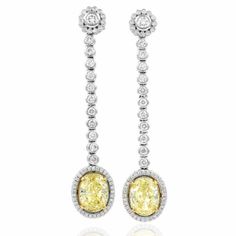 Fancy Yellow Diamond and White Diamond Drop Earrings in Gold | eBay Formal Gia Certified Oval Earrings, Gia Certified Drop Diamond Earrings For Formal Occasions, Gia Certified Formal Drop Earrings, Luxury Oval Gia Certified Earrings, Formal Yellow Earrings With 17 Jewels, Yellow Earrings With 17 Jewels For Formal Occasions, Gia Certified Dangle Earrings For Formal Events, Gia Certified Dangle Earrings For Formal Occasions, Classic Yellow Oval Earrings