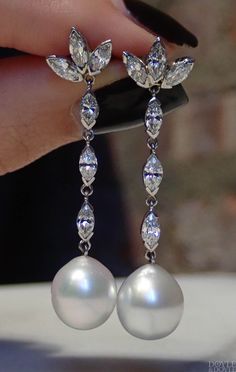 Elegant vintage diamond and pearl drop earrings, featuring shiny light gray pearls suspended from sparkly diamonds. Fashioned in platinum. From Doyle & Doyle, in New York. #doyledoyle #pearlearrings #dropearrings Marquise Cut Diamond, Jewelry Images, Antique Earrings, Diamond Drops, Pearl Grey, Diamond Drop Earrings, Marquise Cut, Pearl Drop Earrings, Vintage Diamond