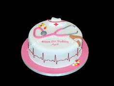 a birthday cake with a nurse's hat and stethoscope on top