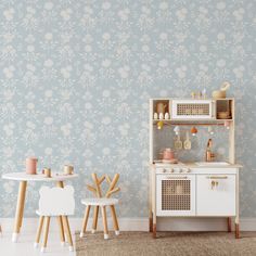 Blue peel and stick wallpaper with delicate white floral pattern, adding a touch of elegance and beauty to any space. White Girl Nursery, Remove Wallpaper, Blue And White Wallpaper, Nursery Playroom, How To Install Wallpaper, Wallpaper Calculator, White Wallpaper, Traditional Wallpaper, How To Make Notes