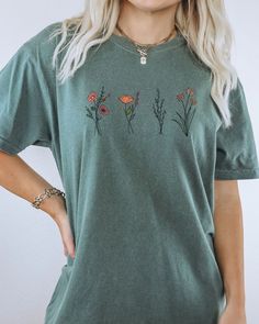 Spring Everyday Tops With Plant Print, Everyday Spring Tops With Plants Print, Floral Embroidery Crew Neck Top As Gift, Casual Spring Tops With Birth Flower Design, Botanical Short Sleeve Tops With Relaxed Fit, Trendy Cotton Tops With Plant Print, Floral Print Tops For Summer, Floral Print Summer Tops As A Gift, Casual Floral Print T-shirt As Gift