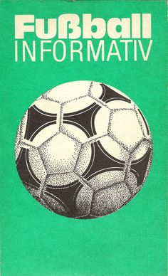 a green book with an image of a soccer ball