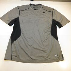 NIKE PRO COMBAT DRI FIT ATHLETIC JERSEY TEE T SHIRT Mens M Gray Size Mens M    GREAT CONDITION   100% AUTHENTIC QUALITY MADE The shirt measures from armpit to armpit 22"    and measures from top to bottom 29" The color is: Gray The fabric content is: 84% Polyester 16% Spandex   GM5 The letters above are for us to locate the item in our collection    There are more large photos of this item at the bottom of the page     &n Nike Sporty Breathable T-shirt, Sporty Gray T-shirt For Running, Nike Functional T-shirt For Sports Events, Nike Athletic Fit Sports T-shirt, Dri-fit Crew Neck T-shirt For Streetwear, Nike Breathable Sportswear T-shirt, Nike Sportswear Breathable T-shirt, Sporty Dri-fit Crew Neck T-shirt, Gray Athletic Streetwear Tops