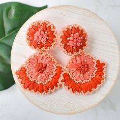 Add a pop of color to your style with these Coral Raffia Flower Drops. These earrings are lightweight, making them comfortable to wear all day. Perfect for adding a touch of fun and vibrancy to any outfit. Made with high-quality materials for durability and style. Lead and Nickel free. Raffia Earrings, Western Jewellery, Western Jewelry, Modern Shop, Pop Of Color, Sales Gifts, Jewelry Inspiration, Your Style, Beaded Jewelry