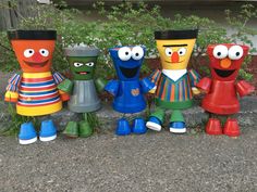 the sesame street characters are lined up together