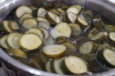 the food is being cooked in the pot on the stove