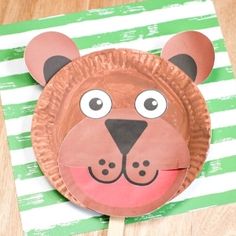 a paper plate with a bear face on it