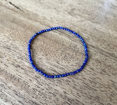 Wear this stunning bracelet alone or in a wrist stack! 2mm Round Smooth Lapis lazuli Stretchy string  Enjoy! Blue Stretch Bracelet With Tiny Beads, Blue Single Strand Bracelets With Round Beads, Blue Gemstone Beads Minimalist Bracelets, Blue Single Strand Bracelet With Round Beads, Blue Minimalist Bracelets With Tiny Beads, Minimalist Blue Gemstone Bead Bracelets, Minimalist Blue Bracelets With Tiny Beads, Minimalist Blue Bracelet With Tiny Beads, Dainty Blue Stackable Bracelets