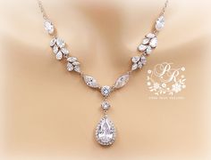 This sparkling bridal necklace and earrings created with Rhinestone, 25mm Zirconia teardrop and finished off with lobster clasp. This gorgeous jewelry set will look elegant and beautiful quality on any classic or vintage inspired bride! Wonderful gift for both a loved one and yourself. All zirconia shines a lot! Finish: Silver Platinum plated components Material: Top quality rhinestones, AAA Zirconia, lobster clasp. Length of Necklace: 17.5 inches and 2 inches extender. Length of Earrings: 2 3/4 Earrings Zirconia, Wedding Hair Pin, Silver Earrings Wedding, Earrings Bride, Bridesmaid Gifts Earrings, Wedding Necklace Set, Bride Necklace, Wedding Bridesmaid Jewelry, Platinum Rose Gold