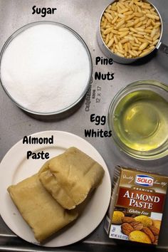 ingredients to make peanut butter cookies on a baking sheet