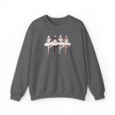 Elevate your ballet wardrobe with our cozy crewneck sweatshirt, designed for dancers of all shades. Ideal for warming up before ballet class, rehearsals, or performances, this stylish and comfortable sweatshirt celebrates diversity with dancers of various skin tones. A thoughtful and unique gift for ballet enthusiasts of all ages, our sweatshirt is not just a piece of clothing but a statement of inclusivity and passion for the art of dance. Step into the spotlight with this distinctive ballet sweatshirt that embraces the beauty of diversity in the dance community. Sizing: Model in Graphite Heather is wearing L, model in Sand is wearing XL for oversized look, both are size S for regular fit.  These garments are made from polyester and cotton. This combination helps designs come out looking Ballet Warm Up Clothes, Art Of Dance, Spanish Dancer, Ballet Gift, Black Ballerina, Ballet Class, Dance Art, Swan Lake, Cut And Style