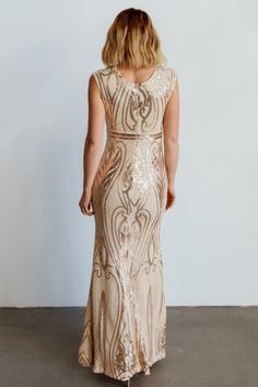 Stunning champagne hue with rose gold sequins. This maxi mermaid fit gown is the definition of sophistication, and grace! Champagne Sequin Gala Dress, Champagne Contrast Sequin Dress For Gala, Champagne Wedding Dress With Contrast Sequin, Fitted Sleeveless Sequined Mother Of The Bride Dress, Gold Fitted Sequin Dress For Gala, Fitted Sequin Bridesmaid Dress, Fitted Bridesmaid Dresses With Sequins, Fitted Gold Sequin Dress For Prom Season, Fitted Contrast Sequin Wedding Dress