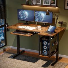 a computer desk with two monitors and a keyboard on it in front of a window