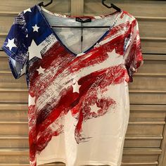 Nwt- C.O.Z.Y Abstract American Flag T-Shirt. Never Worn, Great Condition!! Size Medium. American Flag Print V-neck Tops For Summer, Summer V-neck T-shirt With American Flag Print, Summer V-neck Tops With American Flag Print, V-neck Tops With American Flag Print For Summer, Patriotic V-neck Summer Tops, Cotton V-neck Top With American Flag Print, Red Tops With American Flag Print For Spring, Casual Red T-shirt With American Flag Print, Casual White Shirt With American Flag Print