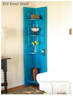 a blue corner shelf with vases on it