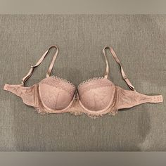 New Without Tags Women’s Victoria’s Secret Very Sexy Lace Bra. Size 36d. “Uplift Balconette” Style. Dark Blush/Nude/Light Mauve Color. Adjustable Straps. Hook Closure. Lace Detailing All Over And Going Around The Bottom Of Bra. Not A Push Up Bra But Has Some Padding On The Inside. Tags: Women’s, Bra, Victoria’s Secret, Size 36d, Lace, Blush, Nude, Mauve, Straps, Adjustable, Hook Pink Lined Bra For Party, Feminine Victoria's Secret Bra With Padded Cups, Victoria's Secret Feminine Bra With Padded Cups, Pink Party Bra With Lined Body, Feminine Pink Bra With Lined Body, Pink Full Cup Padded Bra, Pink Full Cup Bra With Padded Cups, Feminine Pink Partially Lined Bra, Feminine Victoria's Secret Bra With Removable Pads