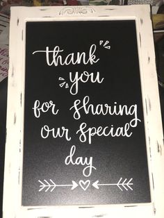 a chalkboard sign that says thank you for sharing our special day